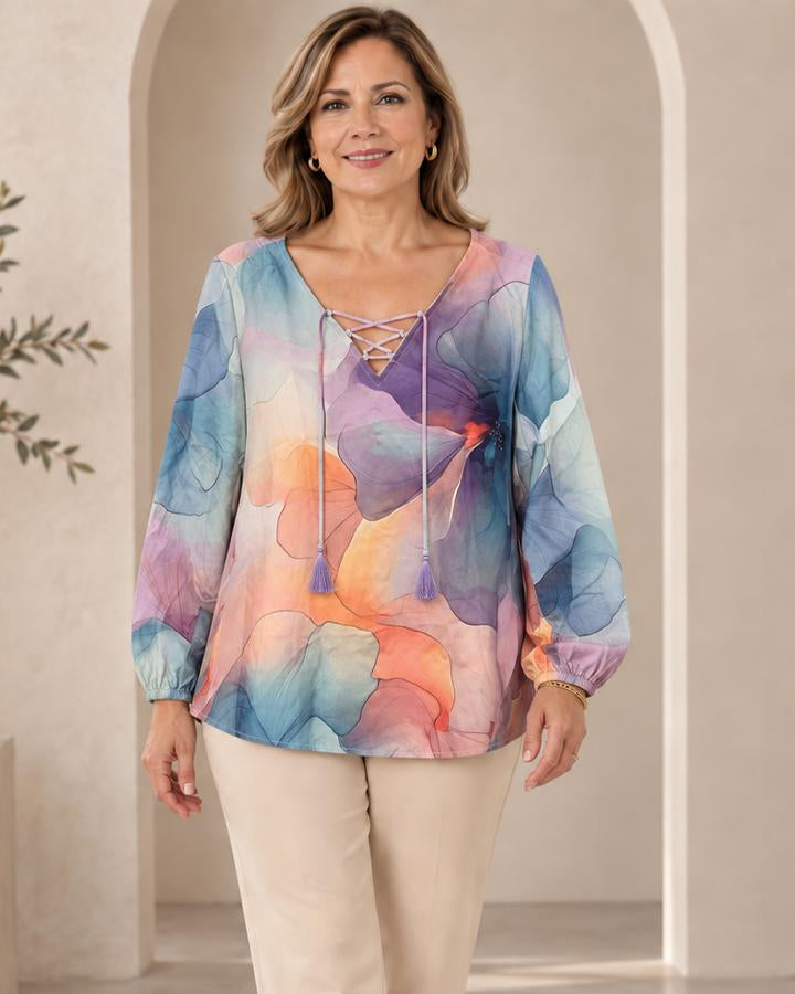 Blusa escote en V con manga bombacha