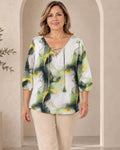 Blusa escote en V con manga bombacha