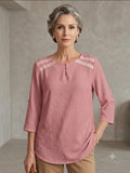 Blusa escote redondo con abertura