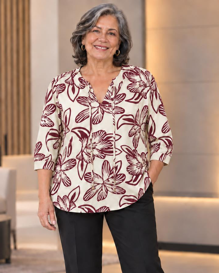 Blusa escote redondo con abertura