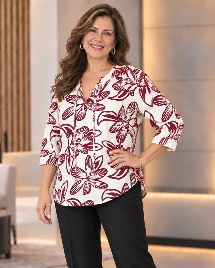 Blusa escote redondo con abertura