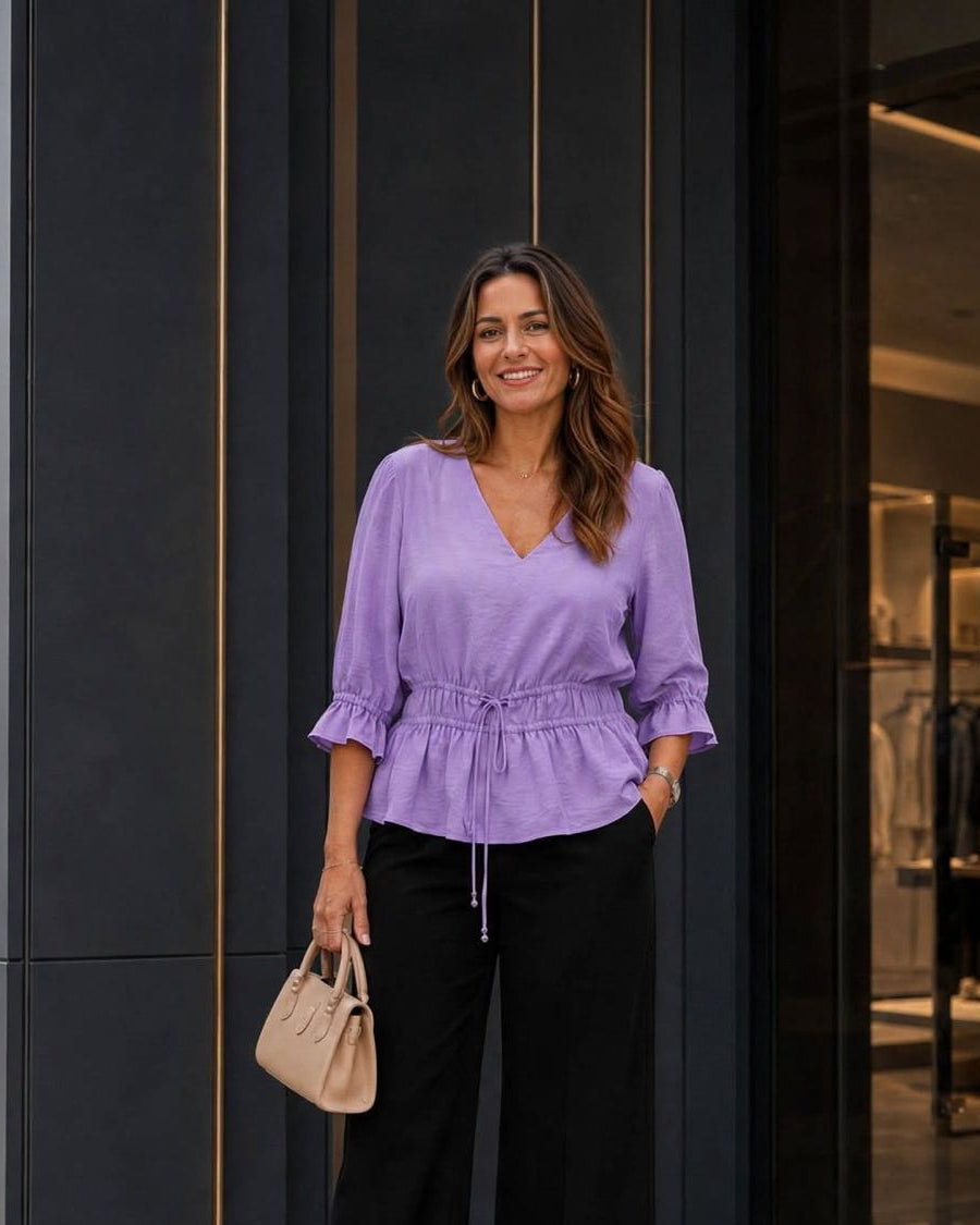 Blusa delantero doble con fajón y puños enresortados